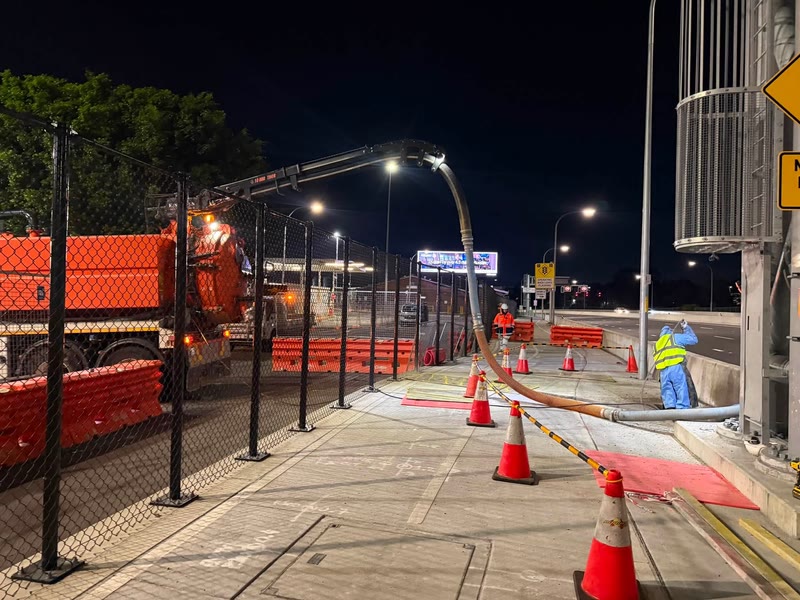Controlled night work area with safety cones and barriers